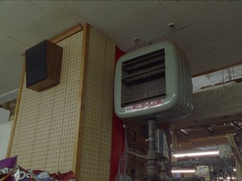 Movie still from “Black Fly - Wait” (2019), directed by Patrick Golan – Wide shot, Low angle