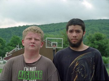 Movie still from “Black Fly - Wait” (2019), directed by Patrick Golan – Medium shot, Low angle