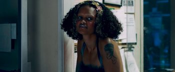 Movie still from “Kiccc - Here” (2019), directed by Riun Garner – Close Up shot, Low angle