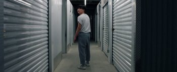 Movie still from “Kiccc - Here” (2019), directed by Riun Garner – Medium shot, Low angle