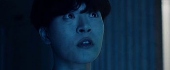 Movie still from “Kiccc - Here” (2019), directed by Riun Garner – Close Up shot, Low angle