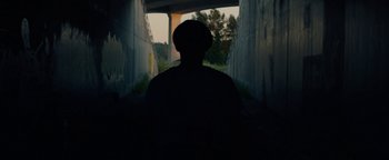 Movie still from “Kiccc - Here” (2019), directed by Riun Garner – Medium shot, Low angle