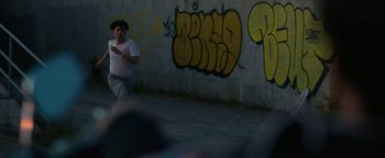 Movie still from “Kiccc - Here” (2019), directed by Riun Garner – Medium shot, Low angle
