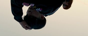 Movie still from “Kiccc - Here” (2019), directed by Riun Garner – Extreme Close Up shot, Low angle