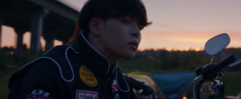 Movie still from “Kiccc - Here” (2019), directed by Riun Garner – Close Up shot, Low angle