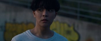 Movie still from “Kiccc - Here” (2019), directed by Riun Garner – Close Up shot, Low angle