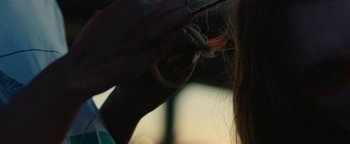 Movie still from “Kiccc - Here” (2019), directed by Riun Garner – Extreme Close Up shot, Over the shoulder angle