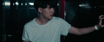 Movie still from “Kiccc - Here” (2019), directed by Riun Garner – Close Up shot, Low angle