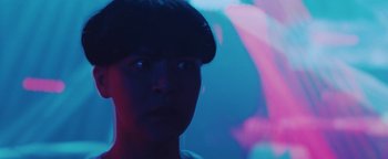 Movie still from “Kiccc - Here” (2019), directed by Riun Garner – Close Up shot, Low angle
