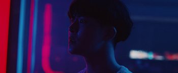 Movie still from “Kiccc - Here” (2019), directed by Riun Garner – Close Up shot, Low angle