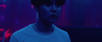 Movie still from “Kiccc - Here” (2019), directed by Riun Garner – Close Up shot, Low angle