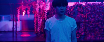 Movie still from “Kiccc - Here” (2019), directed by Riun Garner – Medium shot, Low angle