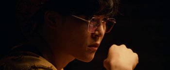 Movie still from “Kiccc - Here” (2019), directed by Riun Garner – Close Up shot, Low angle