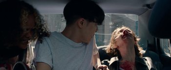 Movie still from “Kiccc - Here” (2019), directed by Riun Garner – Close Up shot, Over the shoulder angle