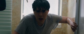 Movie still from “Kiccc - Here” (2019), directed by Riun Garner – Close Up shot, Low angle