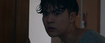 Movie still from “Kiccc - Here” (2019), directed by Riun Garner – Close Up shot, Low angle