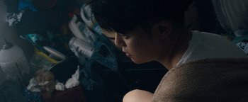 Movie still from “Kiccc - Here” (2019), directed by Riun Garner – Close Up shot, High angle