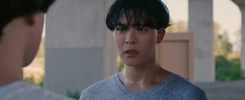 Movie still from “Kiccc - Here” (2019), directed by Riun Garner – Close Up shot, Over the shoulder angle