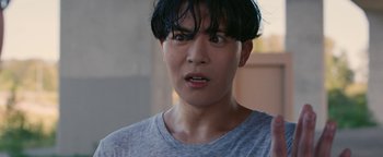 Movie still from “Kiccc - Here” (2019), directed by Riun Garner – Close Up shot, Low angle