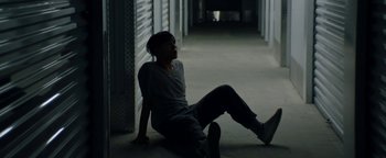 Movie still from “Kiccc - Here” (2019), directed by Riun Garner – Medium shot, Low angle