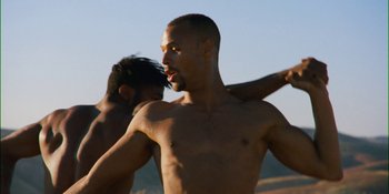 Movie still from “Meernaa - Ready to Break” (2019), directed by Cooper Kenward – Medium shot, Low angle