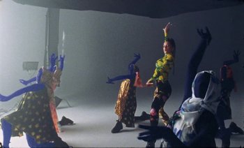 Movie still from “Rosalía & Ozuna - Yo x Ti, Tu x Mi” (2019), directed by Pasqual Gutierrez – Medium shot, High angle