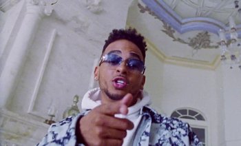 Movie still from “Rosalía & Ozuna - Yo x Ti, Tu x Mi” (2019), directed by Pasqual Gutierrez – Close Up shot, Low angle