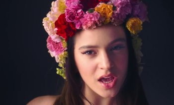 Movie still from “Rosalía & Ozuna - Yo x Ti, Tu x Mi” (2019), directed by Pasqual Gutierrez – Close Up shot, Low angle