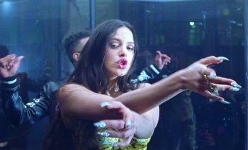 Movie still from “Rosalía & Ozuna - Yo x Ti, Tu x Mi” (2019), directed by Pasqual Gutierrez – Medium shot, Low angle