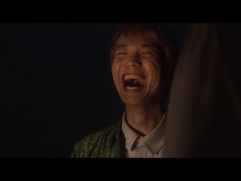 Movie still from “Kite Park - Bongo” (2019), directed by Danny Griffioen – Close Up shot, Low angle