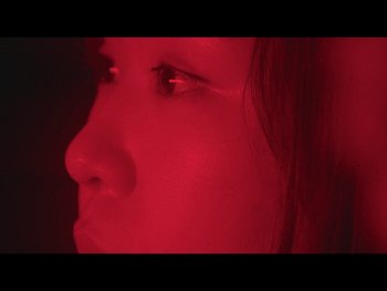 Movie still from “Kite Park - Bongo” (2019), directed by Danny Griffioen – Extreme Close Up shot, Low angle