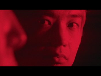 Movie still from “Kite Park - Bongo” (2019), directed by Danny Griffioen – Extreme Close Up shot, Low angle