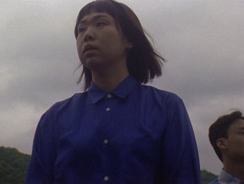 Movie still from “Kite Park - Bongo” (2019), directed by Danny Griffioen – Medium shot, Low angle