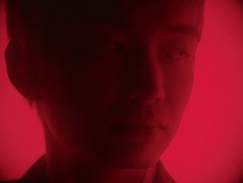 Movie still from “Kite Park - Bongo” (2019), directed by Danny Griffioen – Extreme Close Up shot, Low angle