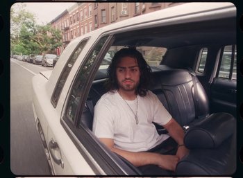 Movie still from “Ali Gatie - It’s You” (2019), directed by Nathan R. Smith – Medium shot, Low angle