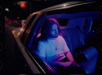 Movie still from “Ali Gatie - It’s You” (2019), directed by Nathan R. Smith – Medium shot, High angle