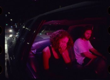 Movie still from “Ali Gatie - It’s You” (2019), directed by Nathan R. Smith – Medium shot, High angle