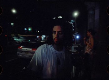 Movie still from “Ali Gatie - It’s You” (2019), directed by Nathan R. Smith – Medium shot, High angle