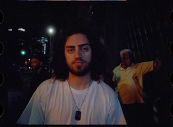 Movie still from “Ali Gatie - It’s You” (2019), directed by Nathan R. Smith – Medium shot, Low angle