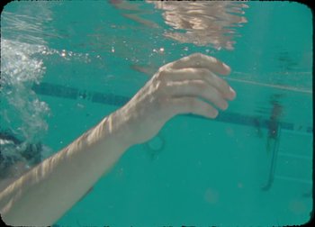Movie still from “Figs Vision - Boy Pressure” (2019), directed by Jake Saner – Extreme Close Up shot, Overhead angle