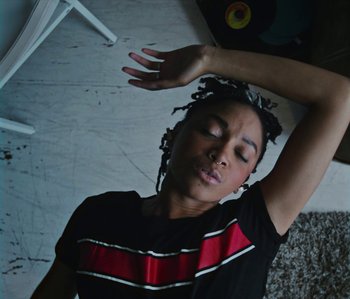 Movie still from “Janette King - Love Another” (2019), directed by Lawrence Le Lam – Close Up shot, Overhead angle