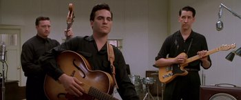 Movie still from “Walk the Line” (2005), directed by James Mangold – Medium shot, Low angle