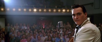 Movie still from “Walk the Line” (2005), directed by James Mangold – Medium shot, Over the shoulder angle