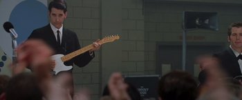 Movie still from “Walk the Line” (2005), directed by James Mangold – Medium shot, Low angle