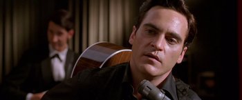 Movie still from “Walk the Line” (2005), directed by James Mangold – Close Up shot, Over the shoulder angle