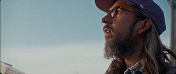 Movie still from “J Travis - Albatross” (2019), directed by Ft. Langley – Close Up shot, Low angle