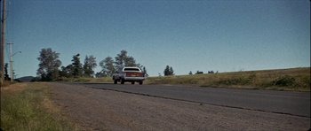 Movie still from “J Travis - Albatross” (2019), directed by Ft. Langley – Extreme Wide shot, Low angle