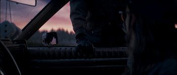 Movie still from “J Travis - Albatross” (2019), directed by Ft. Langley – Close Up shot, Over the shoulder angle