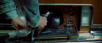 Movie still from “J Travis - Albatross” (2019), directed by Ft. Langley – Extreme Close Up shot, Overhead angle