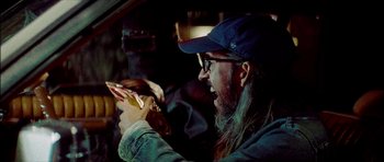 Movie still from “J Travis - Albatross” (2019), directed by Ft. Langley – Close Up shot, Over the shoulder angle